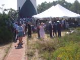 Crowd scene at base of lighthouse