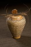 Meandering Glacier River, Sheila M. King, 2007. Materials: Spalted maple base, rim, lid with burl finial and natural twig embellishments.