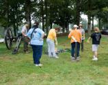 Scouts rake leaves