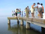 Visitors Learn to Throw a Cast Net