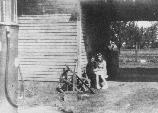 Ms. Lillian in front of store