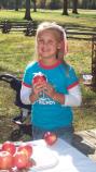 Girl holding pomanders she just made