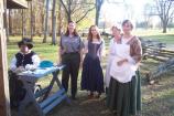 Costumed interpreters and park staff