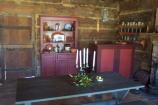 Historic cabin decorated for the holidays