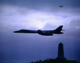 Planes of different eras over the monument
