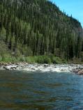 Exposed rock in Charley River rapids