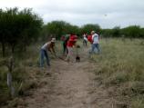 Volunteers from Laughlin Air Force Base clear a 4 ft wide path at San Pedro Campgrounds.