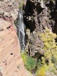 The Upper Falls drops 80 feet over exposed volcanic rock from the neck of a volcano. In Autumn, box elders turn a lovely shade of gold.