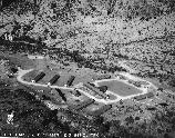 View of the CCC camp located in the Chisos Basin. Lettered buildings identified as: A- Headquarters Building B-Officer's Quarters C-Infirmary D-Recreation Hall E-Mess Hall F-Kitchen G-Radio Station H-Technical Service Quarters I through N-Crew Quarters O-Technical Office P-Chisos Power & Light Office