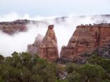 Misty monoliths in Monument Valley.