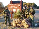 rangers at montezuma pass with a bales of illegal drugs