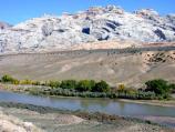 Split Mountain rises behind the Green River