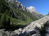 View of Cascade Canyon and trail with Cathedral Group in background.