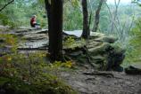 A park visitor and her dog enjoy Ledges overlook
