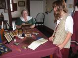 Artist Kelly James creates minature, watercolor and oil portraits and scenes in the Grand Room of the Great Hall.