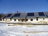 Completed roof and Blue solar panels