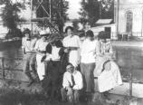 Harry Truman and Bess Wallace with friends at Waterworks Park near Sugar Creek, Missouri, October 1913. L to R: William Rugg, Nell Rugg, Frank Wallace, May Southern, Julia Rugg and Bess Wallace. Harry Truman seated in front. Harry S. Truman Library 82-58-14.