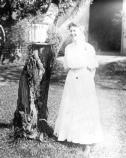 Bess Wallace stands in the yard of her home at 219 N. Delaware, circa 1905. Credit: Harry S. Truman Library, #72-3622.