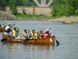 Canoeing the Mississippi River in Wilderness Inquiry canoes. NPS rangers and Wilderness Inquiry staff stern the boats and keep up a lively discussion about life along the river.