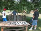 Making fish gigs by hand.
