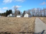 Carsten Burfiend Farm on Port Oneida Road. The barn and other out buildings are located on the other side of the road.