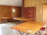 This is a multi-purpose space connected to the dining hall. The door on the right leads to another small room.