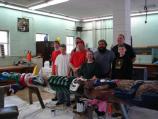 J. Group photo of totem painters