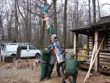 K. Raising the totem pole