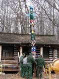 L. Park Maintenance finish raising the totem