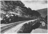 Locamotive alongside canal boat