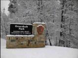The Greenbelt Park entrance sign in the snow