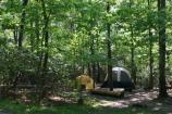a picture of two tents in the campground