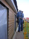 F. Repaired siding prior to painting