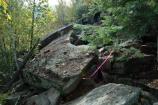 A large slab of granite overhangs the Homans Path, making it impassable.