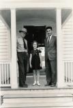 Actress Shirley Temple visited the Yorktown Battlefield on July 1, 1938, and was show the Moore House by Acting Chief Ranger Doust (left) and park Superintendent Floyd Flickinger.
