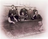 Thomas Edison (seated center), Theo Wangemann (standing center) with the 