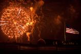 Defenders Day fireworks illuminate the Garrison Flag.