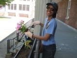 Volunteer Rhonda joins forces to help Fort Jay look beautiful, and restore the look of days when officers and their families were stationed here.