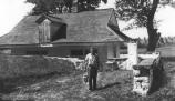 Dairyman in front of Dairy