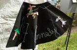 A black poodle skirt with dancing donkeys from the 1952 Senate Campaign