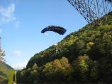 base jumper parachuting from New River Gorge Bridge