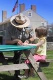 27 Ranger helping child