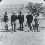 Theodore Roosevelt (second from left) and his party posing at the rim of the Grand Canyon.