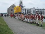 British Troops in red uniforms standing in a line