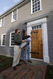 Mathew Cummings (left) and James Whidden in front of the ca. 1737 Day-Dodge House in Ipswich. Thanks to their work to restore the house and build modern additions, the Day-Dodge House received the 2008 Mary P. Conley Award for Historic Preservation from the Ipswich Historical Commission.