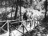 Herbert & Lou Henry Hoover on the foot bridge across Mill Prong.