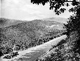 Car and visitors along Skyline Drive