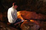 Bill McIver (US Fish and Wildlife Service) tagging Ashy Storm-Petrel nests in the dark caves of north shore Santa Cruz Island.