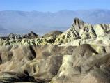 A morning view from Zabriskie Point out over the Golden Canyon Gower Gulch to Manly Beacon.