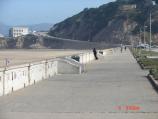 This Pathway that runs the leangth of Ocean Beach is accessible, there is also a view of the Cliffhouse and Camera Obscura up the hill on this bright shiny day.